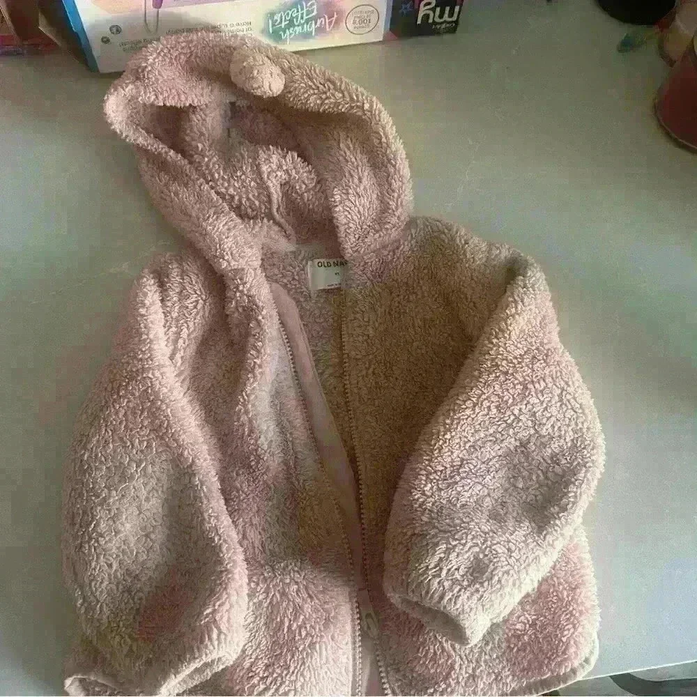 Pink cozy jacket for toddlers.